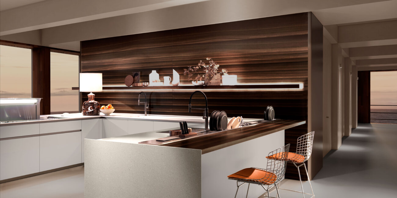 Dettaglio dell'isola di una cucina particolare con gola del modello E0con parete in legno scuro.